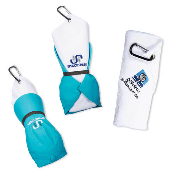 White towels with a green hat bundled together with embroidery artwork on the front