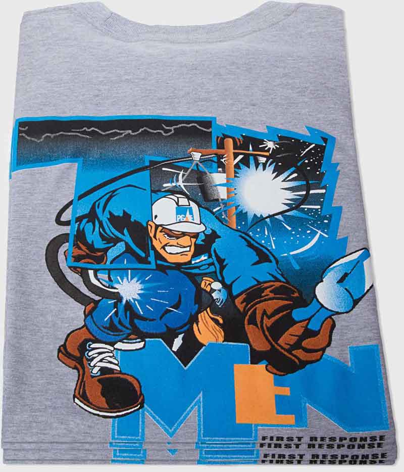 Stack of gray shirts with a buff PG&E worker graphic on the front